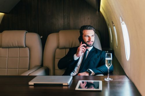 Businessman enjoying a private flight